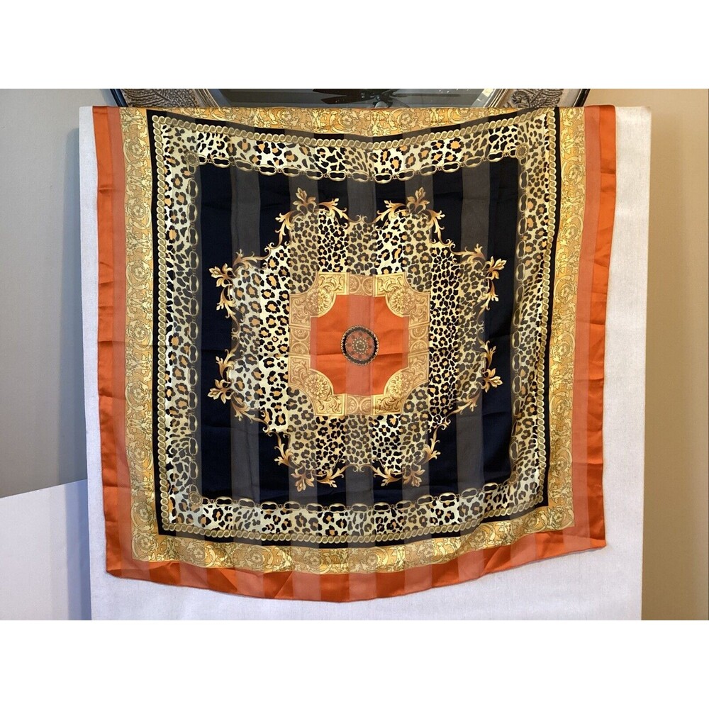 art of the scarf tie rack animal print orange black Italy 34x34”
